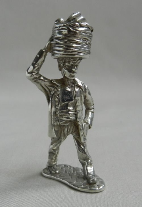 silver fruit porter figure