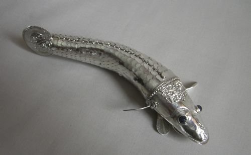 antique silver articulated fish