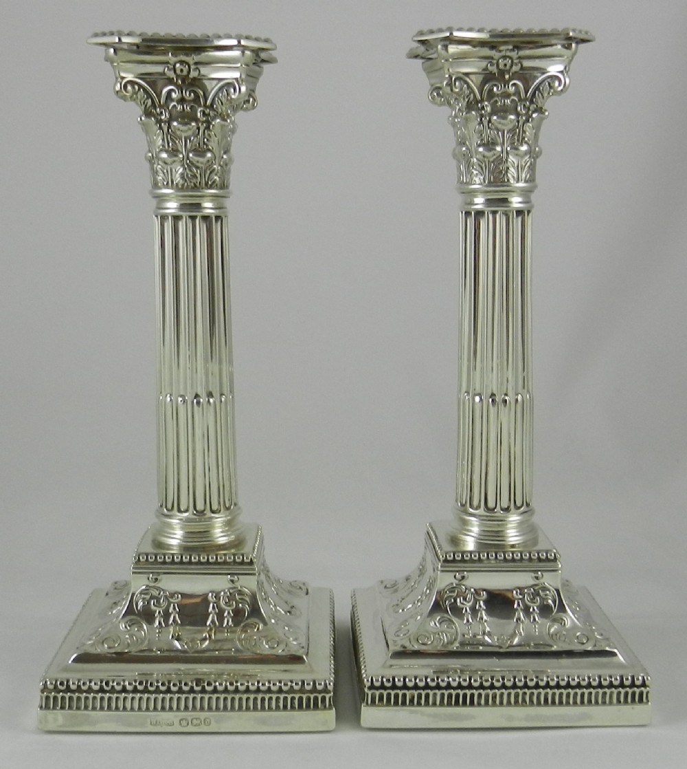 pair antique silver candlesticks