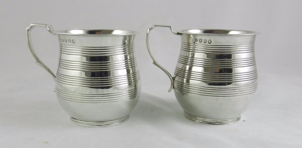pair geo iii silver mugs
