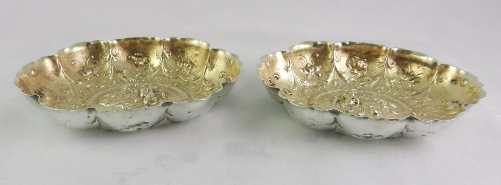 pair of antique silvergilt dishes