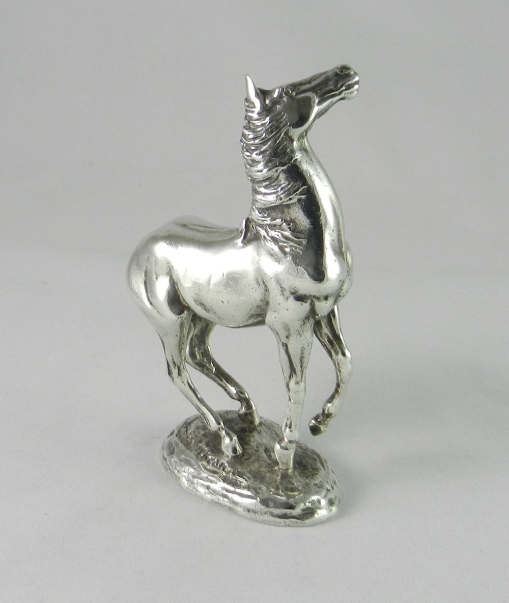 silver horse sculpture