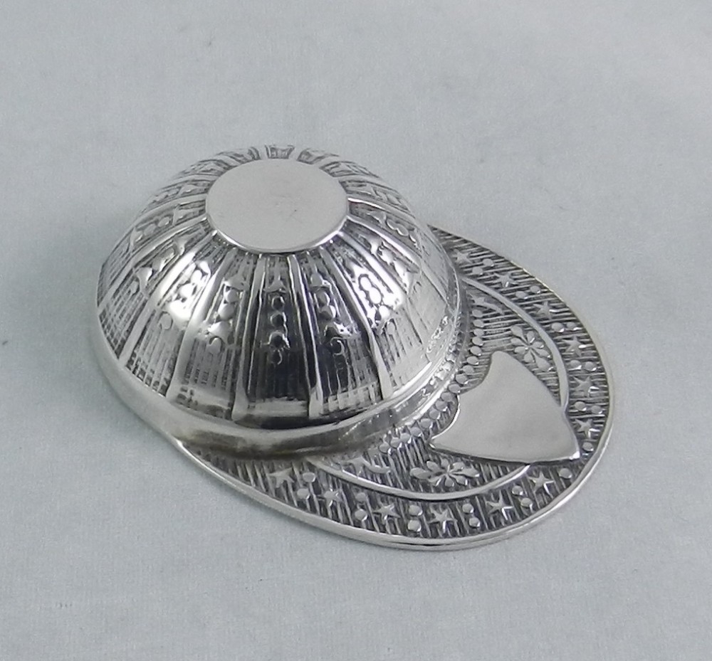 silver jockey cap caddy spoon