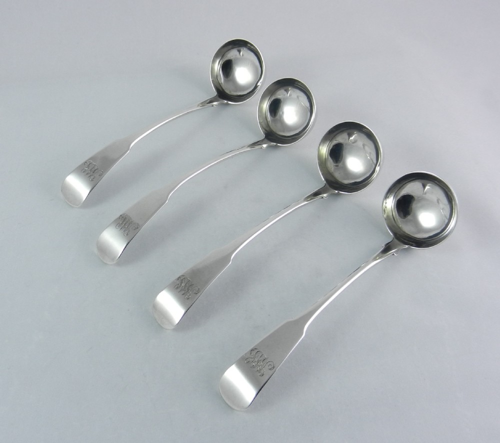 set of four antique silver toddy ladles