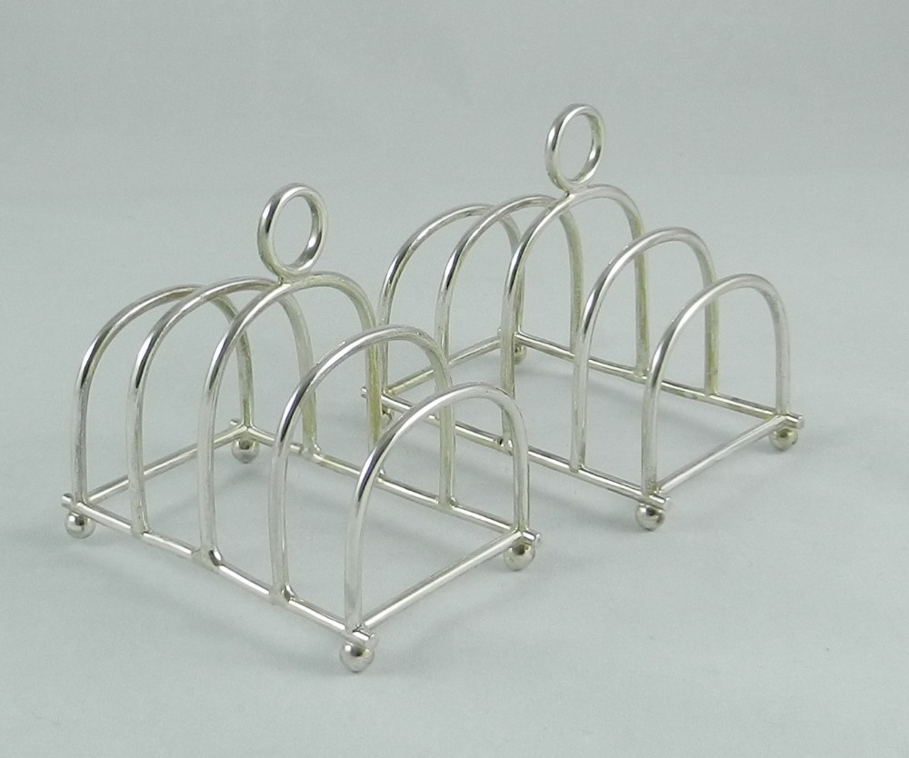 pair antique silver toast racks