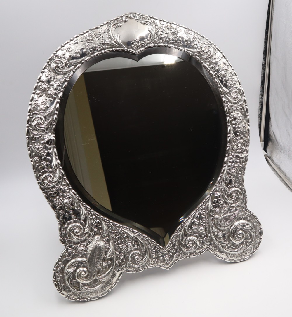 huge antique silver mounted mirror