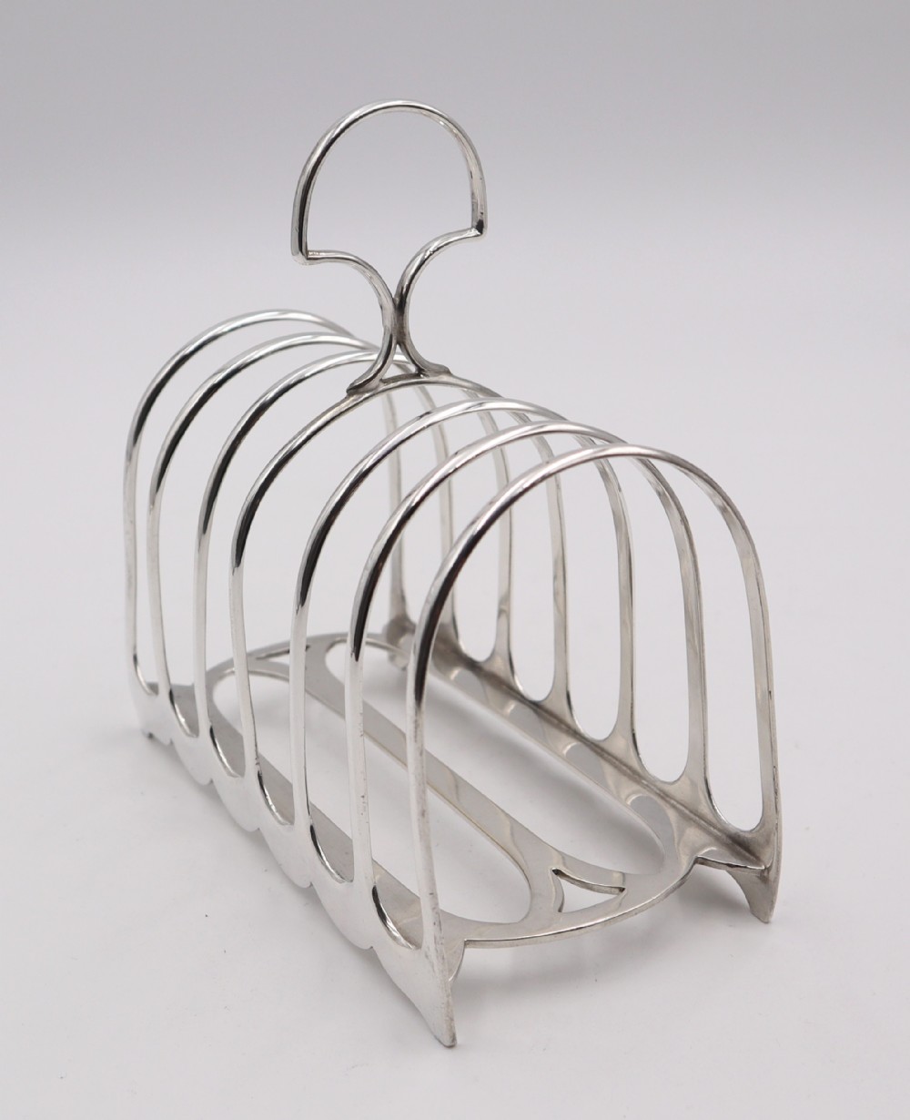 large antique silver toast rack