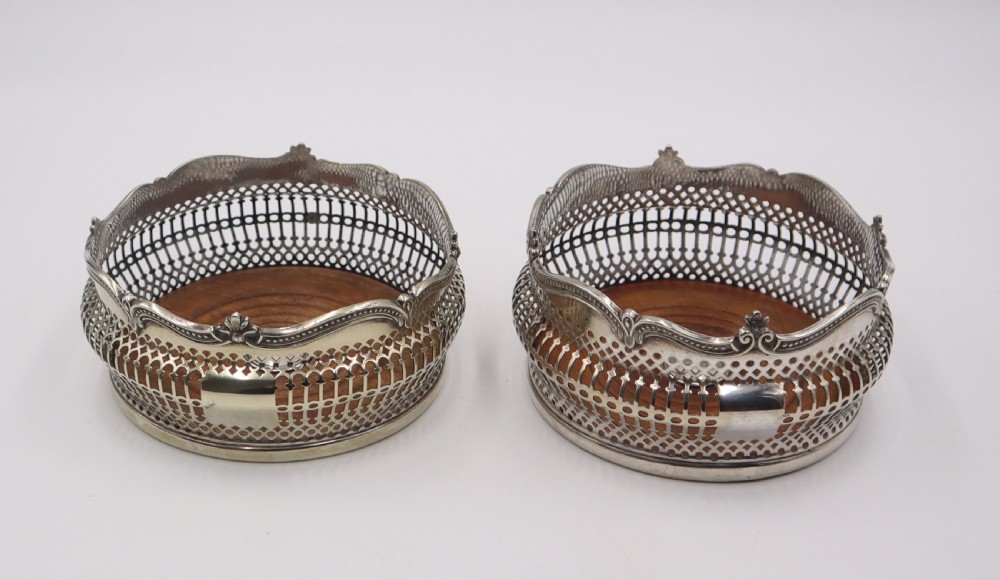 pair antique silverplated coasters